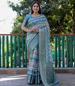 Aqua Blue Woven Design Bandhej Silk Saree With Blouse