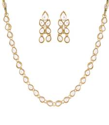 Intricately Handcrafted Jewellery Set Glided With Uncut Polki Kundans For Women 