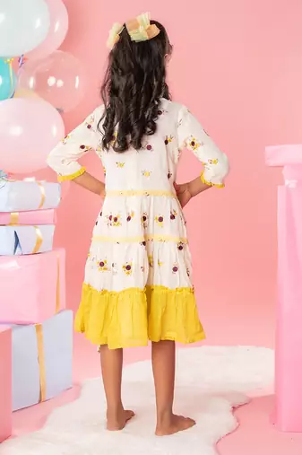 Off white embroidered ruffled hem dress