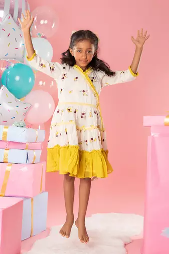 Off white embroidered ruffled hem dress