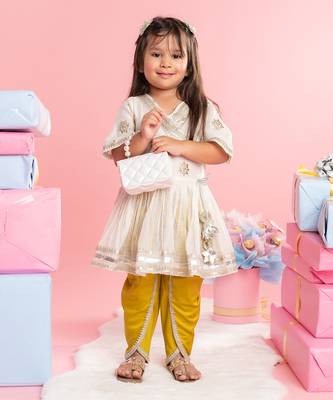 Pleated kurti with yellow dhoti 1