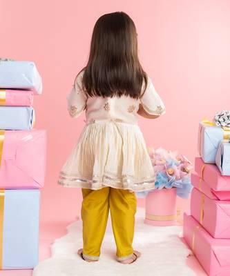 Pleated kurti with yellow dhoti 3