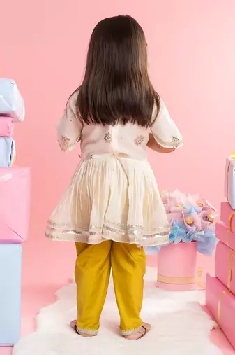 Pleated kurti with yellow dhoti
