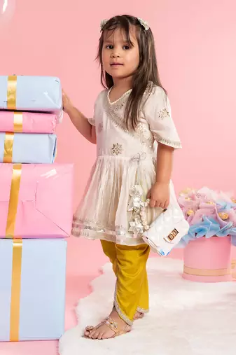 Pleated kurti with yellow dhoti