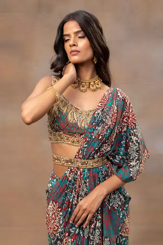 Green printed embroidered ruffle saree and belt set
