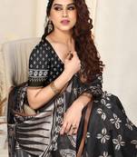 Black art silk block print copper zari border saree with unstitched blouse piece
