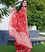 Coral chiffon batik print saree with unstitched blouse piece
