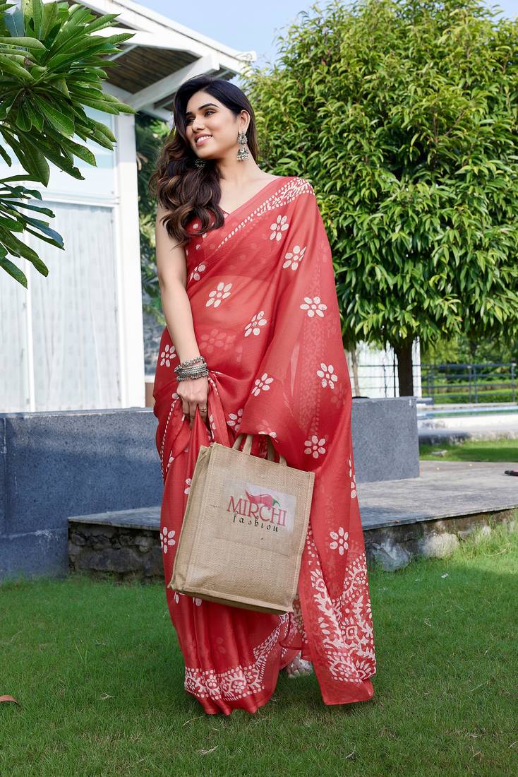 Coral chiffon batik print saree with unstitched blouse piece