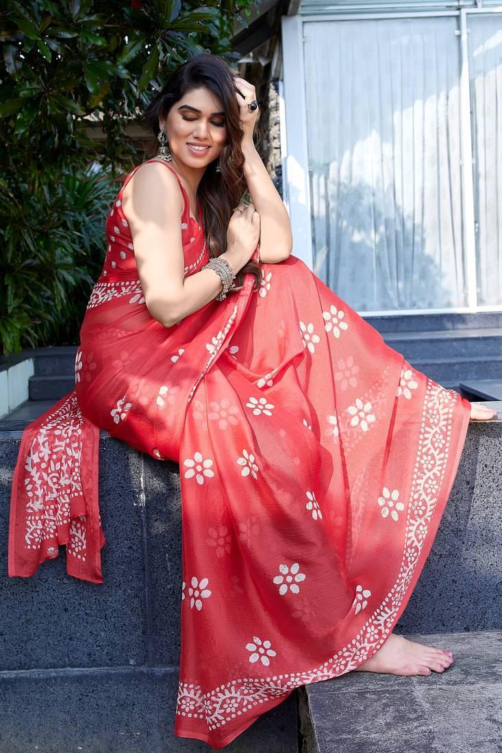 Coral chiffon batik print saree with unstitched blouse piece