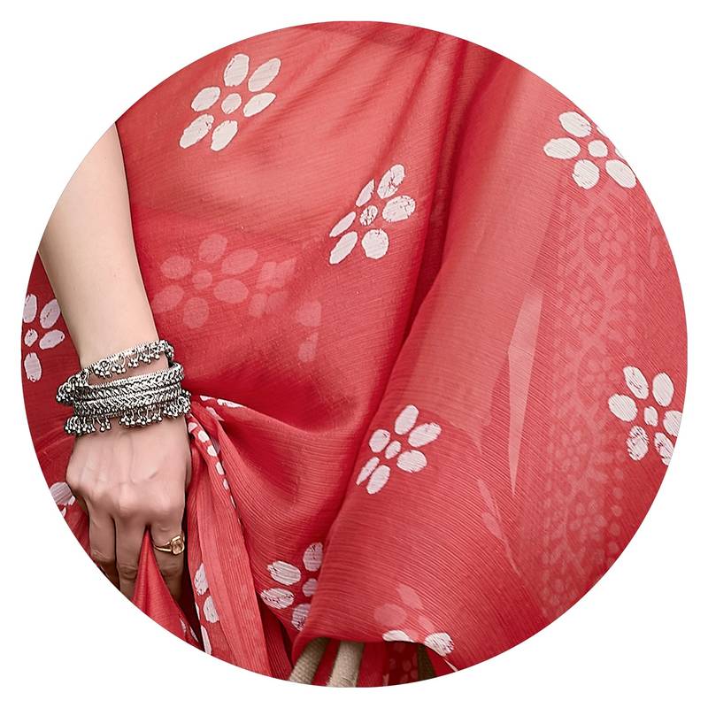 Coral chiffon batik print saree with unstitched blouse piece