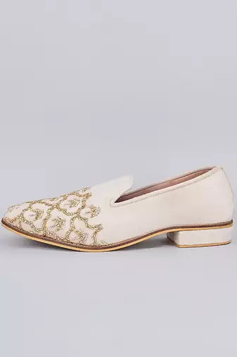 Off white embroidered slip on loafers
