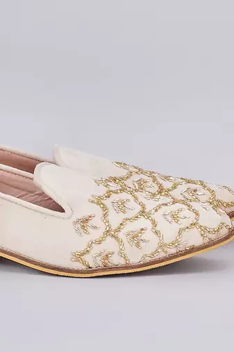 Off white embroidered slip on loafers