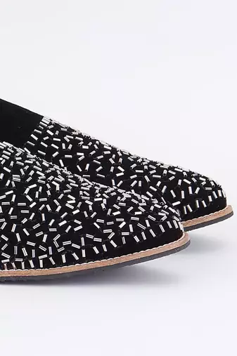 Black embroidered suede slip on loafers