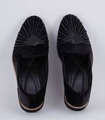 Black embroidered suede slip on loafers