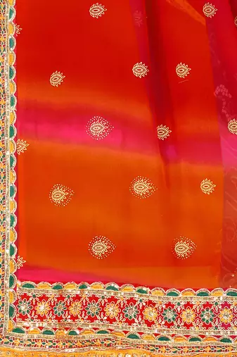 Red georgette bandhani saree with unstitched blouse piece