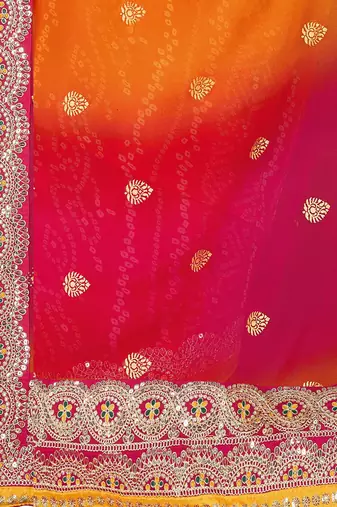 Pink georgette bandhani saree with unstitched blouse piece