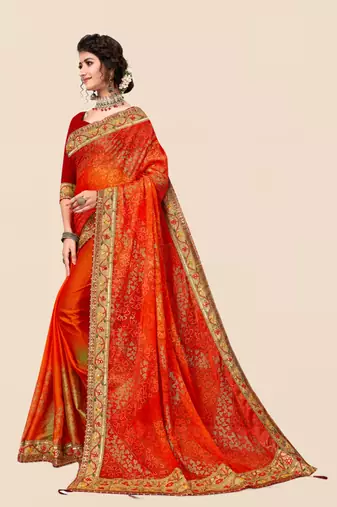 Orange chiffon bandhani saree with unstitched blouse piece