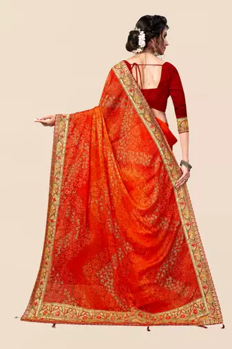 Orange chiffon bandhani saree with unstitched blouse piece