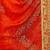 Orange chiffon bandhani saree with unstitched blouse piece