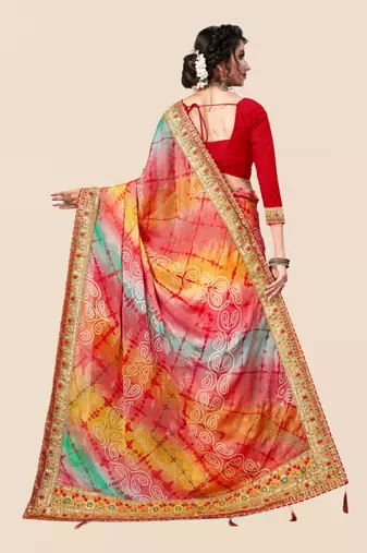 Peach  chiffon bandhani saree with unstitched blouse piece