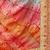 Peach  chiffon bandhani saree with unstitched blouse piece