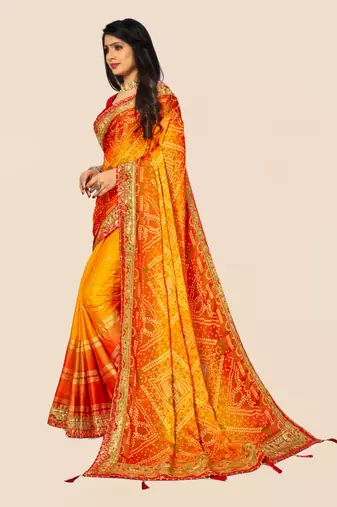 Yellow  chiffon bandhani saree with unstitched blouse piece