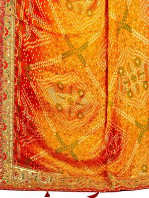 Yellow  chiffon bandhani saree with unstitched blouse piece 5