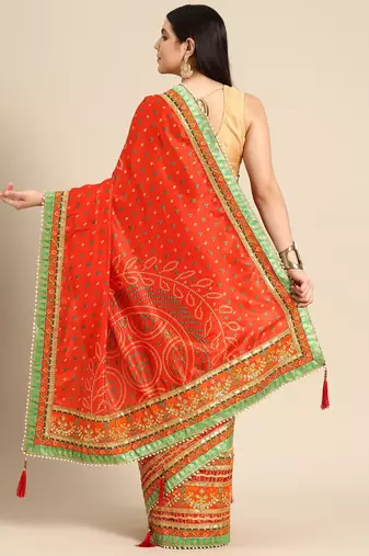 Yellow bandhani saree with lace border and unstitched blouse piece