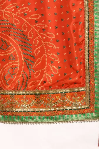 Yellow bandhani saree with lace border and unstitched blouse piece