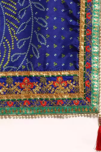 Blue bandhani saree with lace border and unstitched blouse piece