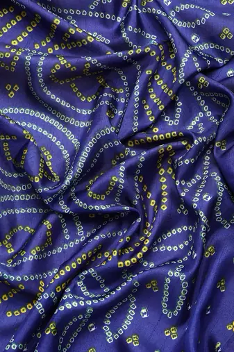 Blue bandhani saree with lace border and unstitched blouse piece