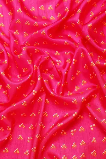 Pink bandhani saree with lace border and unstitched blouse piece