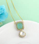 Classic kundan pendant with engraved aqua green stone
