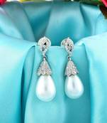 Sparkle ad with pearl drops earrings