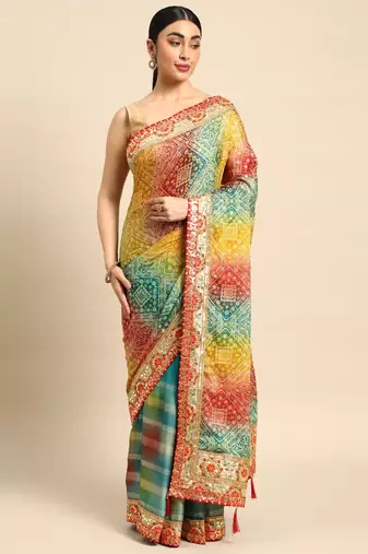 Blue bandhani saree with lace border and unstitched blouse piece