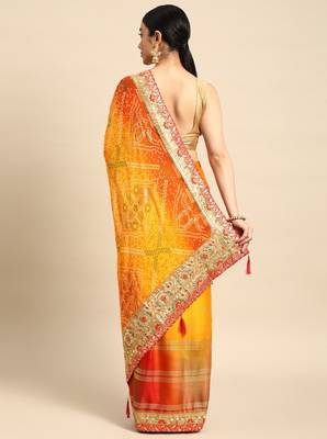 Yellow bandhani saree with lace border and unstitched blouse piece 2