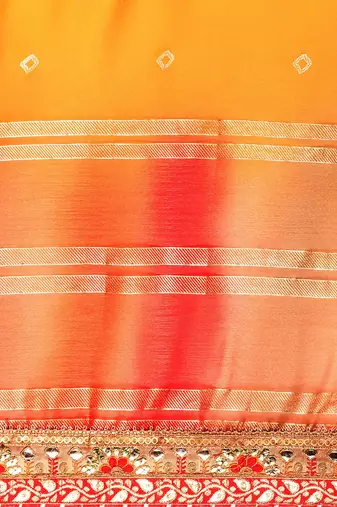 Yellow bandhani saree with lace border and unstitched blouse piece