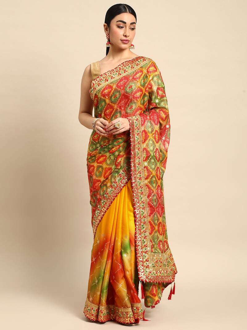 Yellow bandhani saree with lace border and unstitched blouse piece