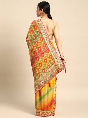 Yellow bandhani saree with lace border and unstitched blouse piece 2