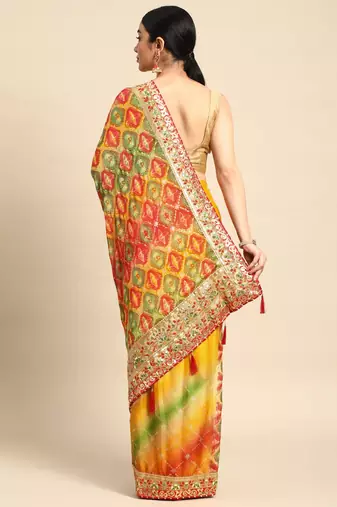 Yellow bandhani saree with lace border and unstitched blouse piece