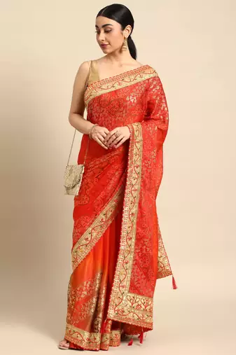 Red bandhani saree with lace border and unstitched blouse piece