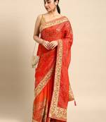 Red bandhani saree with lace border and unstitched blouse piece