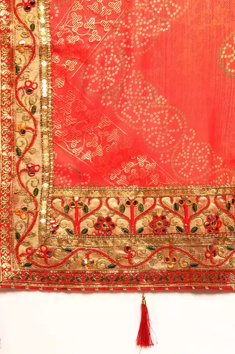 Red bandhani saree with lace border and unstitched blouse piece