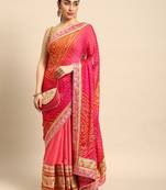 Peach bandhani saree with lace border and unstitched blouse piece