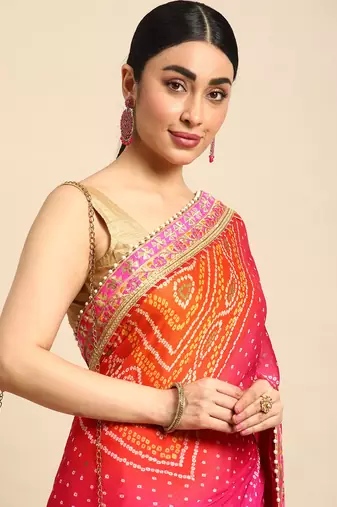Peach bandhani saree with lace border and unstitched blouse piece
