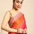 Peach bandhani saree with lace border and unstitched blouse piece