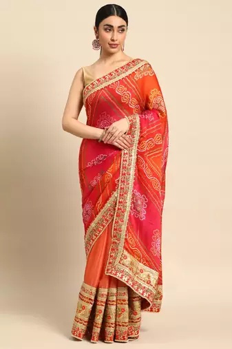 Peach bandhani saree with lace border and unstitched blouse piece