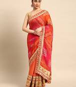 Peach bandhani saree with lace border and unstitched blouse piece
