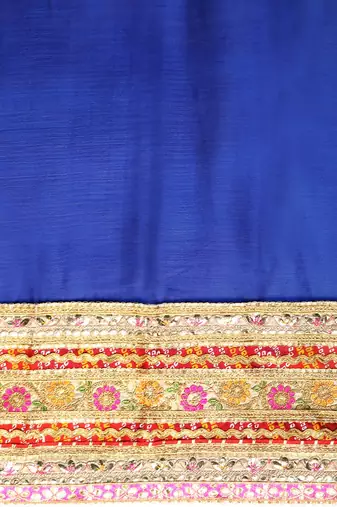 Blue bandhani saree with lace border and unstitched blouse piece