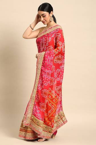Pink bandhani saree with lace border and unstitched blouse piece